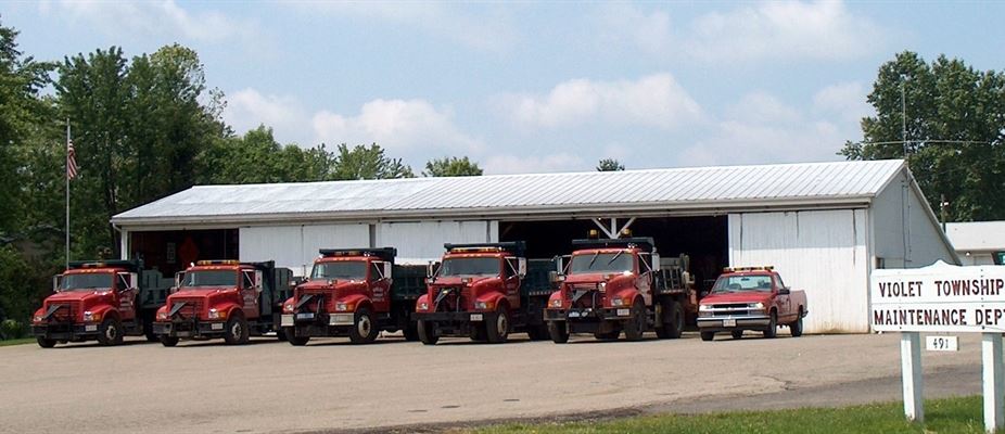 Trucks in front of Maintenance Department