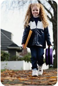 Little girl walking to school